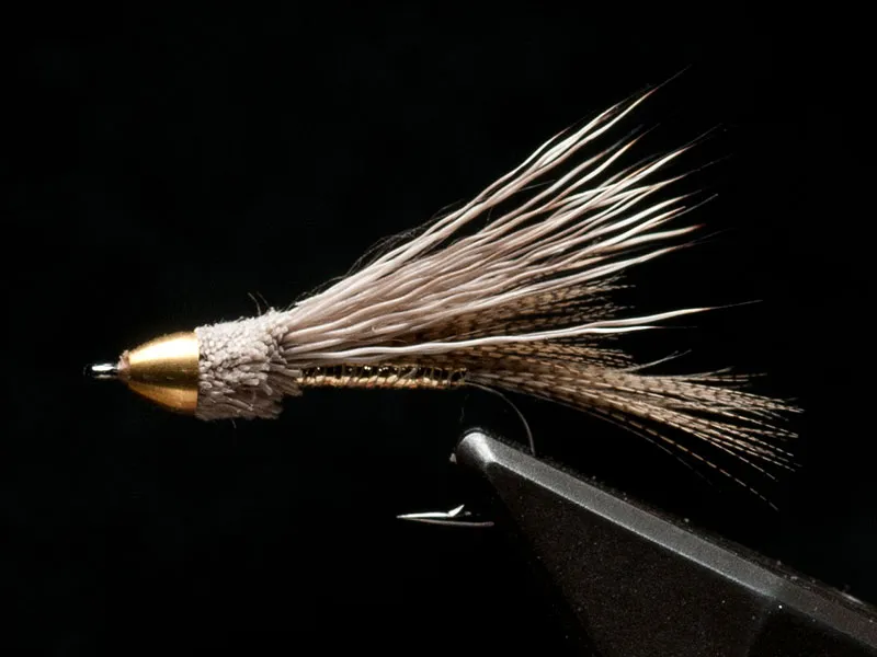 FMJRM - The Full Metal Jacket Rolled Muddler - a Rolled Muddler with a cone in stead of a bead. <a href=\"/patterns/rolled-muddler/\">See materials and full pattern description</a>.